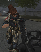 Player equipped with Banshee and the Banshee's FMG-9.