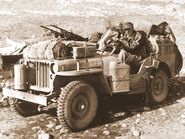 A Willys MB jeep in the Driver's photo with a built-in machine gun on it.