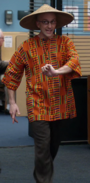 The Dean celebrating the possible ethnicity of Shirley's baby by wearing a sedge hat and dashiki.Appearance: "Custody Law and Eastern European Diplomacy"