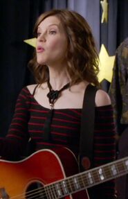 JulieLead vocals and guitaristPortrayed byLisa Loeb