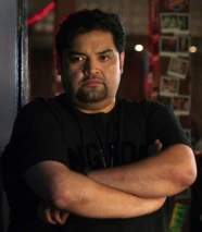 Ballroom bouncerHe stopped Britta suspicious of her ID card. He recognized Shirley as a returning customer and watched as Pierce tried unsuccessfully to enter the bar in his wheelchair.