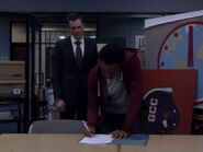 5x01-Jeff Troy signs