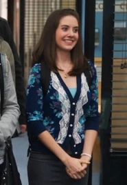 Annie wore this cardigan when Buddy Austin was formally invited to join the study group.Appearance: "Investigative Journalism"