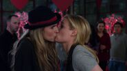 Paige and Britta kiss