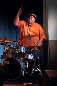 No Worries drummer.jpg (60 KB) DrummerUnnamed drummer who provided percussion for the band. The drummer would also later provide back up for Vaughn when he sang a song to Annie outside the library ("Romantic Expressionism ").Portrayed by:Gian Molina