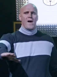 Parker Deay[2]One of the Threes who provided security for the Talent show. He was about to remove a Two who had been down voted and ended up being ejected himself after failing to deliver a decent exit line to the audience.