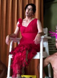 Dean Pelton wore this red dress for the "Hunger Deans" competition. Appearance: "History 101"