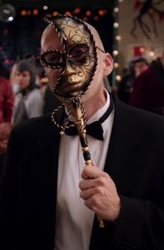 Dean Pelton wore this outfit on Halloween during the study group's first year at Greendale. It was modest in comparison to the oufits he eventually wears, just a tuxedo with a masquerade ball mask.Appearance: Season One episode "Introduction to Statistics"