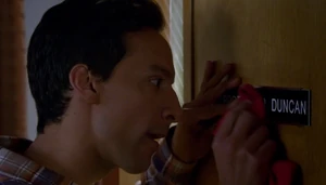 S06E01-Abed polishing Duncan nameplate