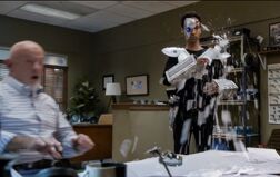 5X7 Abed sprays Hickey's desk