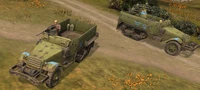 A pair of M5 Half-tracks - basic version on the left, upgraded to the right.