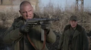 Willoughby-armed.png (1.71 MB) Aiming an MP40 at Ivan Pozarsky.