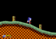 SLD GreenHillAct2 3.png (10 KB) Sonic going through the stage with the strange totem poles.