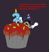 X's second birthday, featuring a giant marinara and pickle meatballs cupcake.