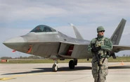 22Nato-sub-superJumbo.jpg (290 KB) MP guards an F-22 Raptor