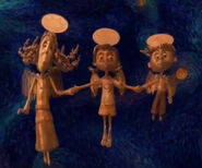 The three ghost children as angels.