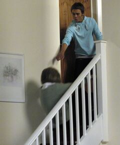 David pushes Gail down the stairs