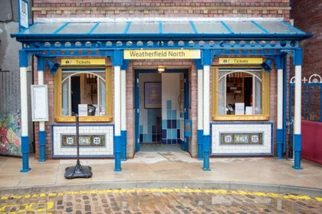 The tram stop exterior in 2018, showing the former railway station's facilities