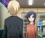Ayumi and Yoshiki talking inside the convenience store.