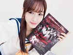 A tease for Corpse Party: Book of Shadows live action with Ayumi holding the poster for the movie