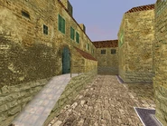 На зображенні ліворуч стоїть закрита дверь, але в релізній версії її немає. Так само справа на будівлі висить плакат, де написано «Emilia Romagna»