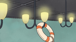 Life preserver hooks around a lamp