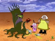 Feo pointing his gun at Courage and Muriel