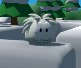 One of the white puffles