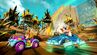 Baby Coco, Crash and Zem racing in Prehistoric Playground