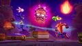 Ripper Roo and Crash fighting Uka Uka during the Speed Run minigame in Tiki Towers.