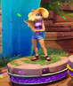 Tawna standing on a podium as a loser
