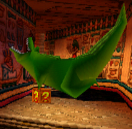A green crocodile in Crash Bandicoot: Warped