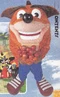 Promotional image of the Japanese Crash mascot suit holding apples