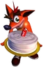 Crash holding a birthday cake