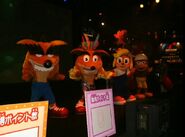 Photo of the Crash, Fake Crash and Coco mascots from the Japanese launch of Crash Bandicoot Carnival.