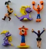 A set of 2001 Crash Bandicoot, Spyro the Dragon, and Tomb Raider cereal box toys by Nestlé in the UK only