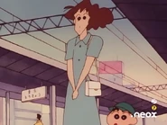 Misae on the platform, next to Shinnosuke saying goodbye to Hiroshi