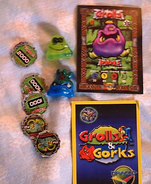 Some figures and the card and coin game