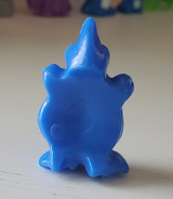 Back of the figure.