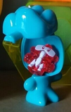 A figure's head opening up to reveal the Mini Gogo inside.