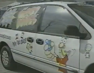 Tux on the side of a car during a promotion