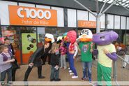 Customers standing next to The Breakz, a fictional band created to advertise the Groovy series promotion.