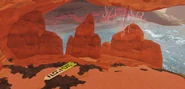 Inkpujin's talisman in a cove beneath the Desert
