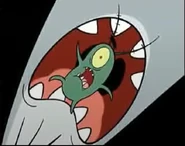 Plankton cayendo hacia las fauces de la ballena gigante