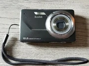 The black digital camera I found in the box.