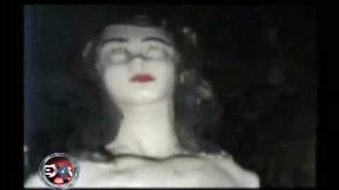 Ghost_Caught_on_video_-_Scary_Statue_Doll_Opens_Eyes