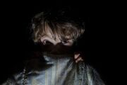 0 Little-boy-afraid-hidind-behind-his-bed-sheets.jpg