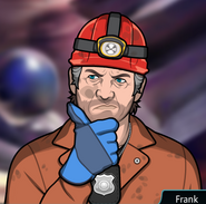 Frank donning caving outfit with blue gloves.