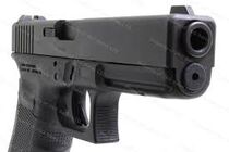 A close-up of a 4th Generation Glock 17.
