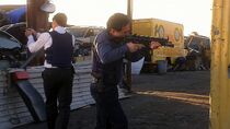 Rossi with an MP5A3.